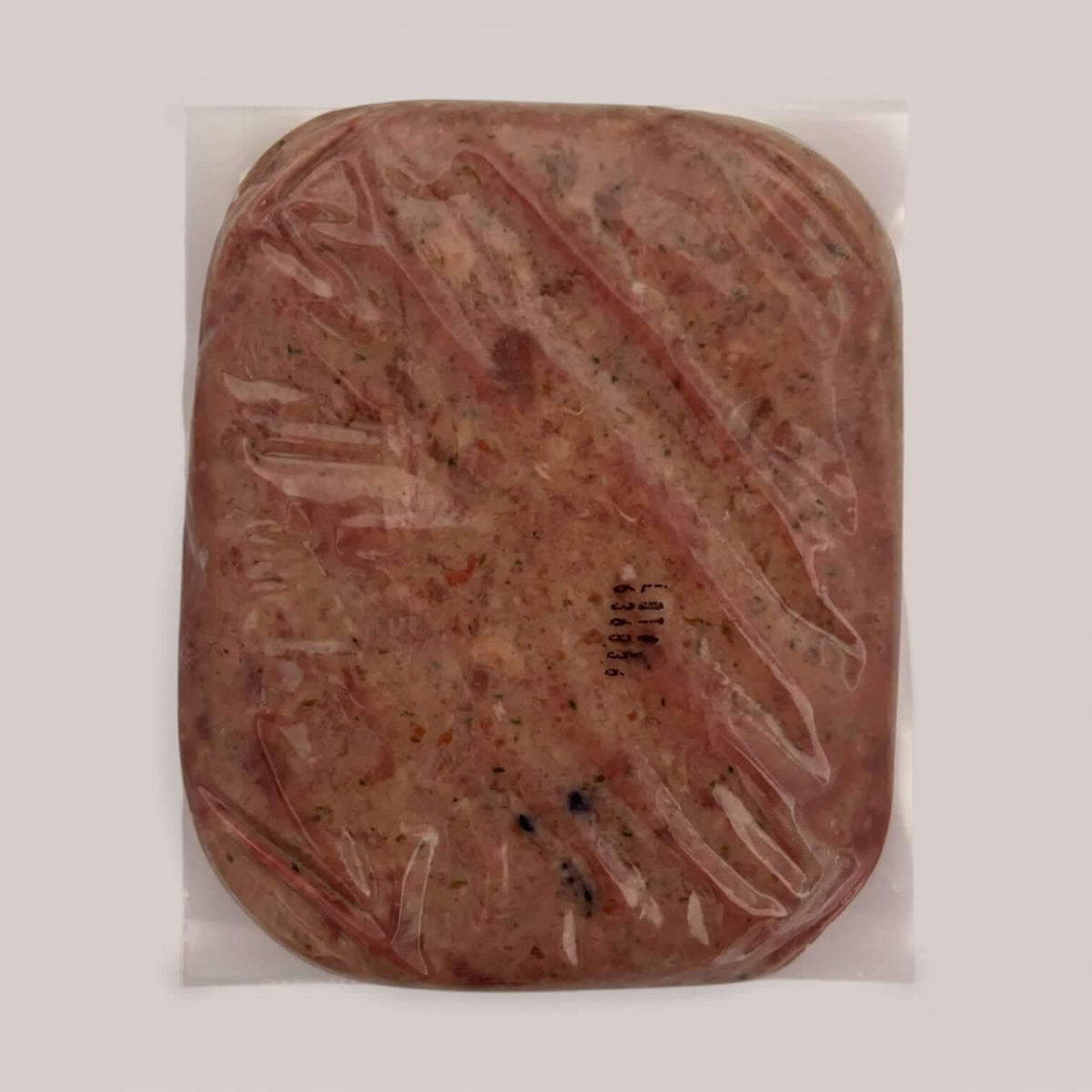 Lamb raw dog food packaging showing a vacuum-sealed portion of lamb-tastic recipe suitable for dogs.