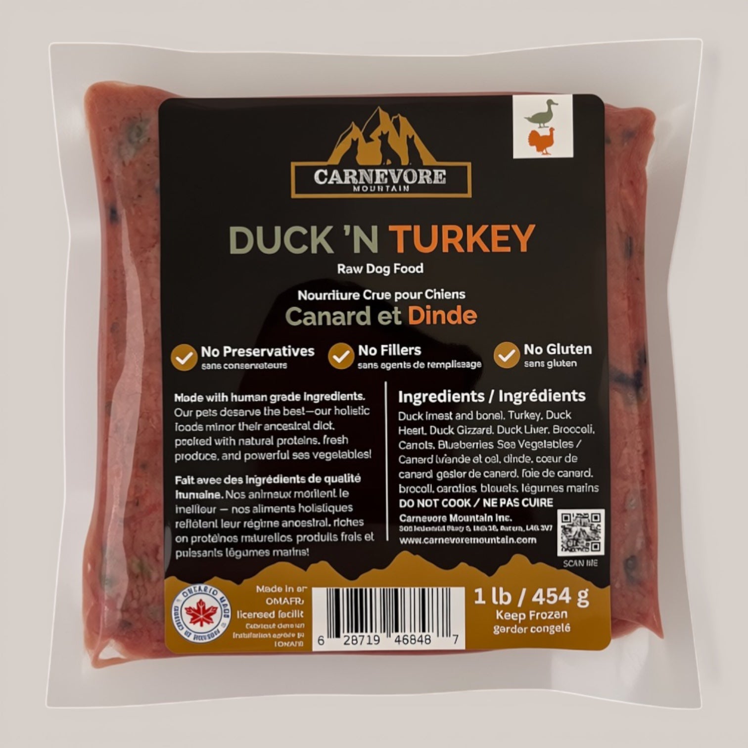 Package of Carnevore Mountain Duck 'N Turkey raw dog food with label details.