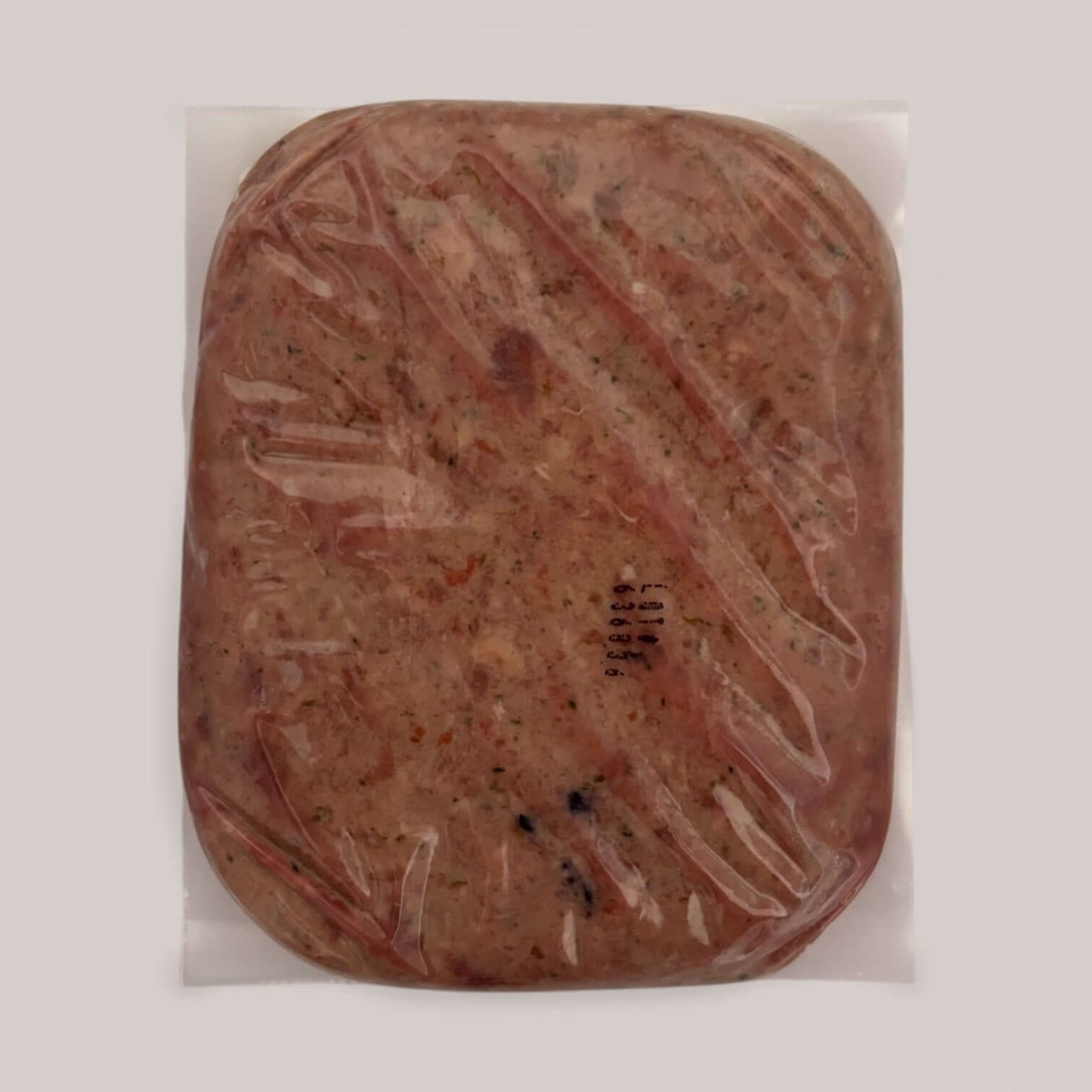 Lamb raw dog food packaging showing a vacuum-sealed portion of lamb-tastic recipe suitable for dogs.