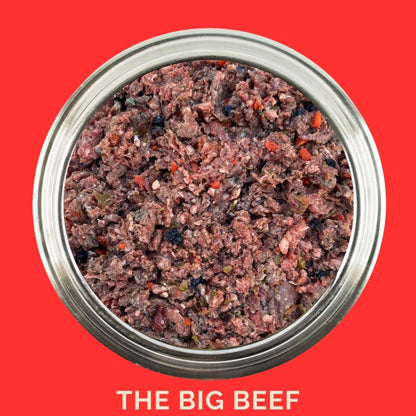 Raw beef dog food in a tin showcasing The Big Beef Recipe, made with nutrient-dense ingredients for optimal dog health.