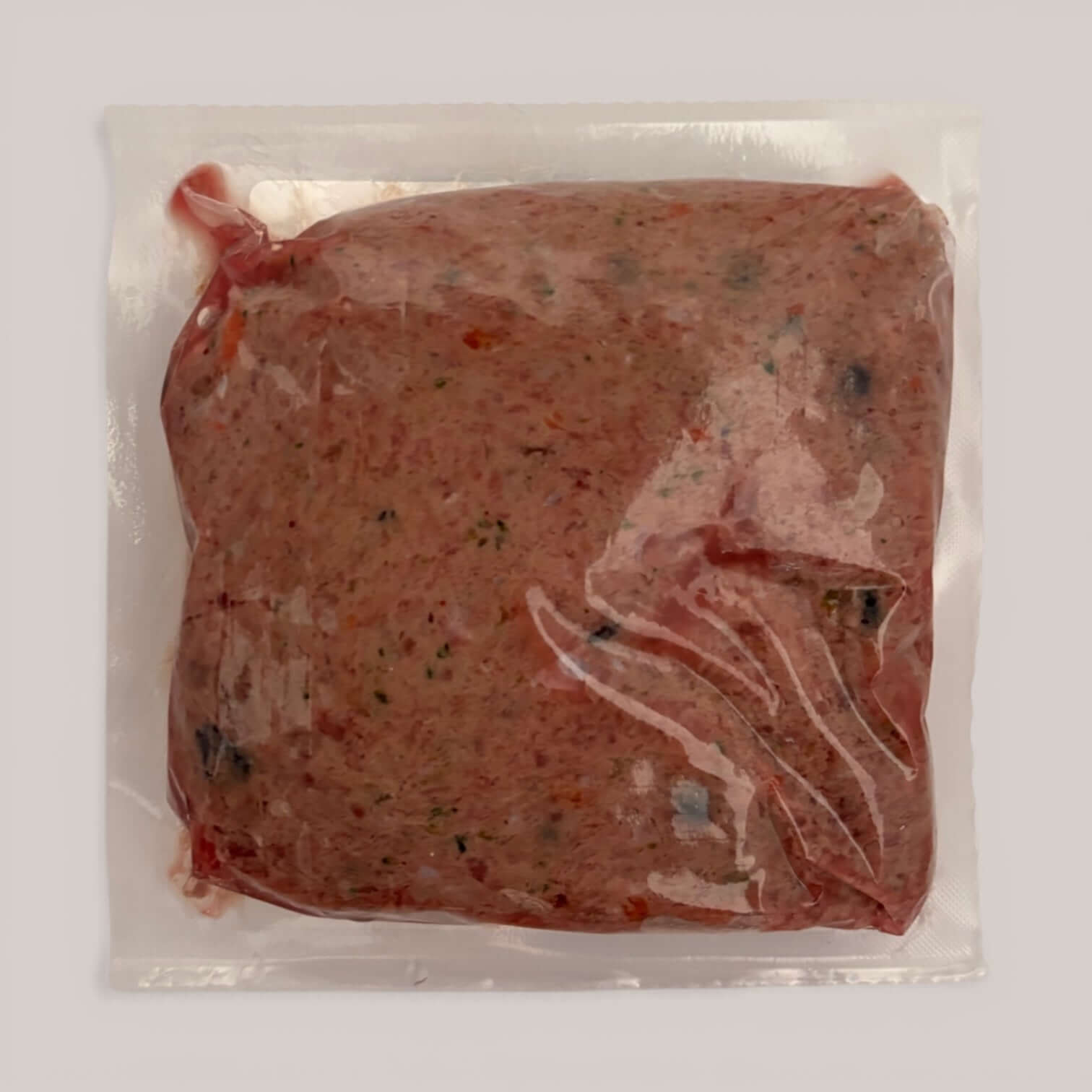 Turkey raw dog food packaged in plastic, made with premium turkey and real ingredients for canine health.