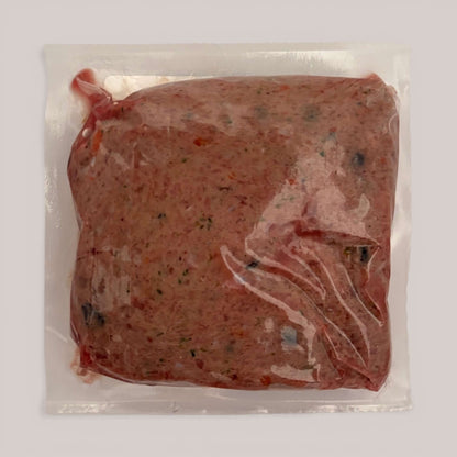 Turkey raw dog food packaged in plastic, made with premium turkey and real ingredients for canine health.